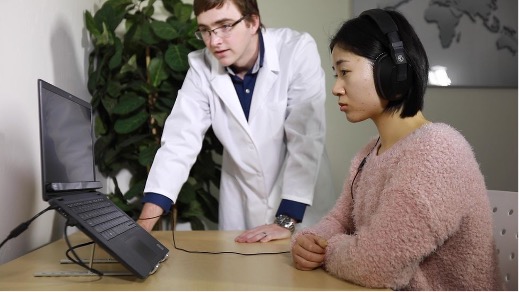 A woman undergoing an EyeDetect test